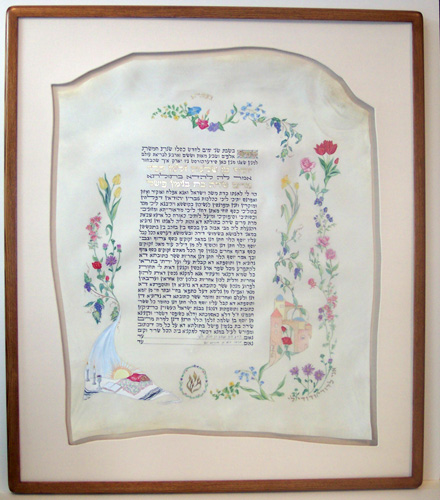 Ketubah framed in a hand-finished wood frame & hand cut/wrapped fabric mat