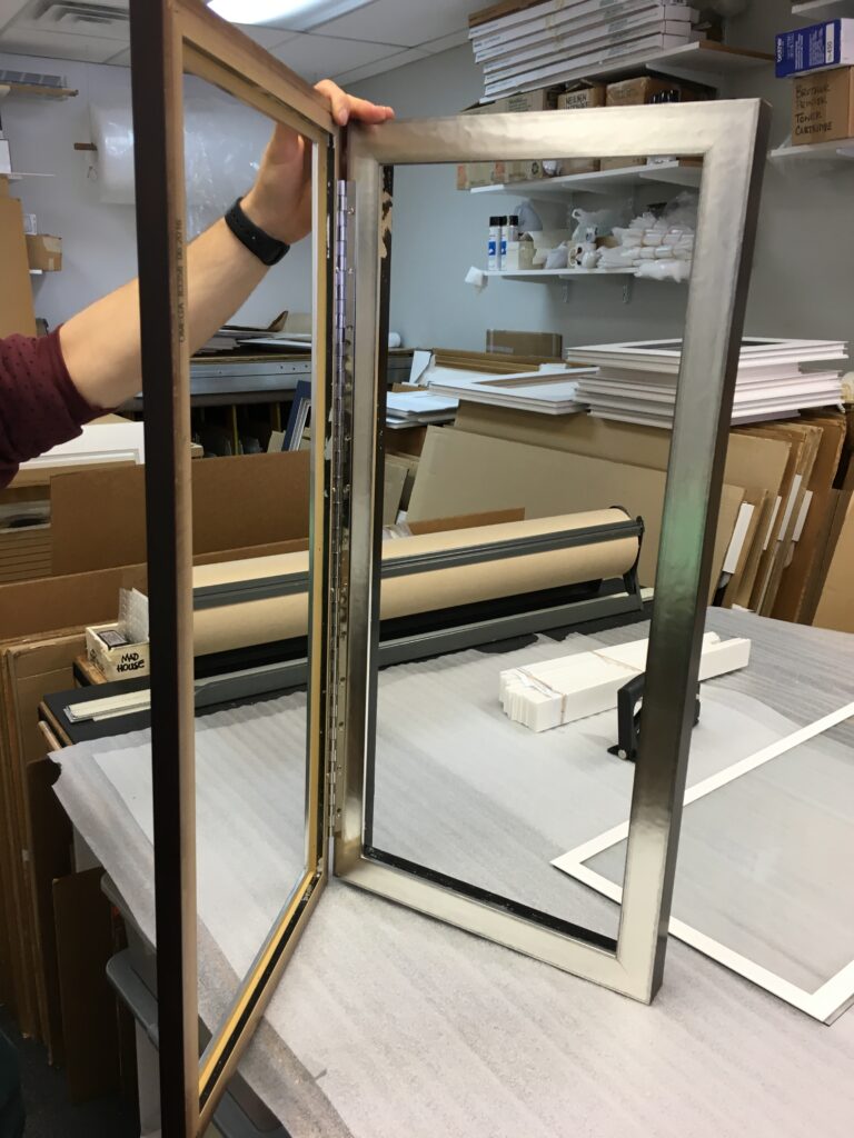 Hinged double frame