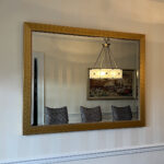 CC Gold beaded mirror hanging